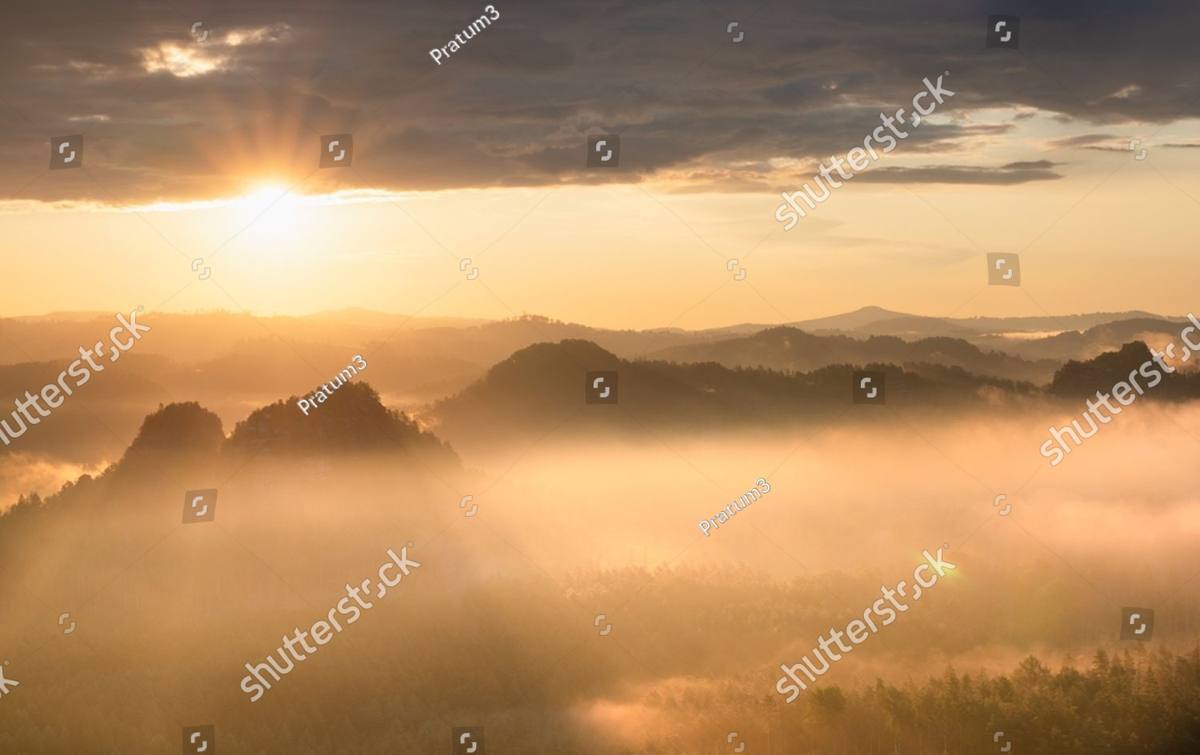 A mountain ridge in the cool light before dawn