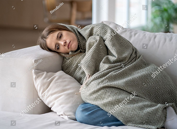 A young woman at home, depleted