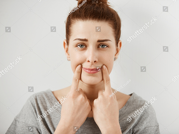 A woman resting alone on a set of stairs